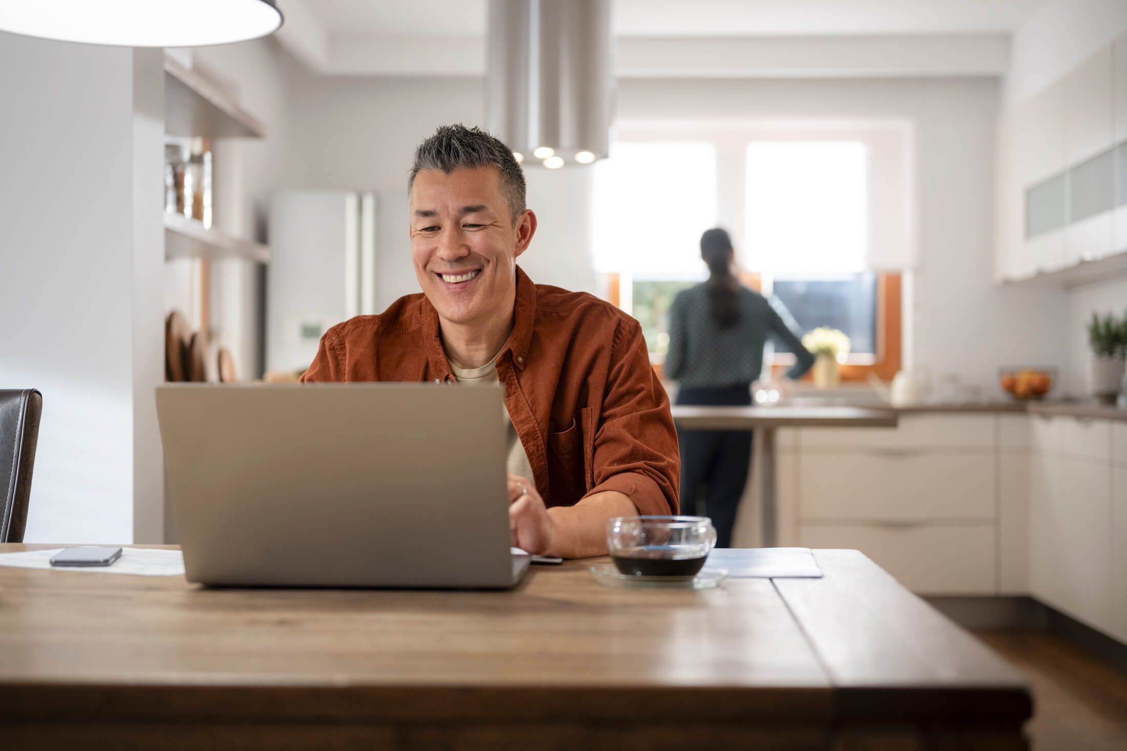 Couple cuddles on couch