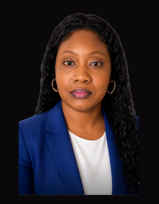 Sophea Anderson, NC Real Estate Agent, professional portrait against a black background.
