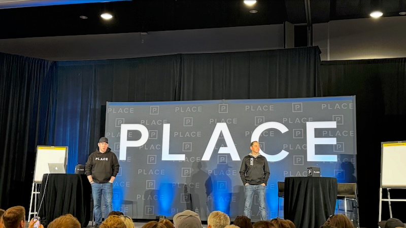 Ben Kinney and Chris Suarez, co-founders of the PLACE real estate platform, on the main stage at PLACE Winners 2026 in Anaheim
