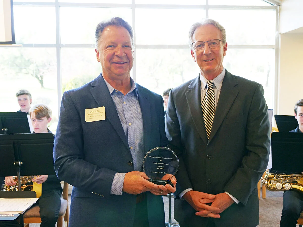 Jon Yoffie receives a Leader in Boardsmanship Award from Buckeye Union School District Superintendent Dr. David Roth
