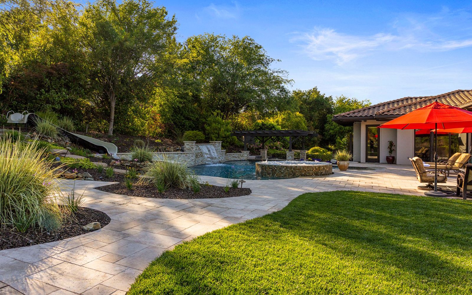 Covered pavilion and firepit lounge at 4355 Gresham Drive