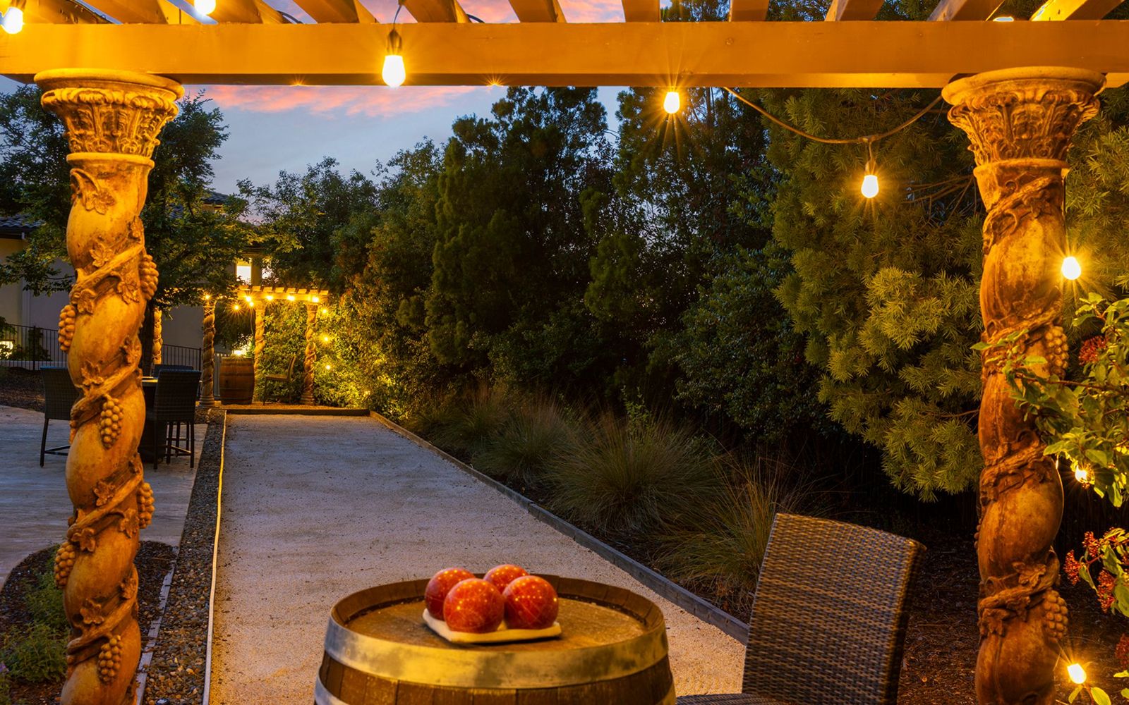Outdoor kitchen and bar seating at Vista del Prato, Serrano