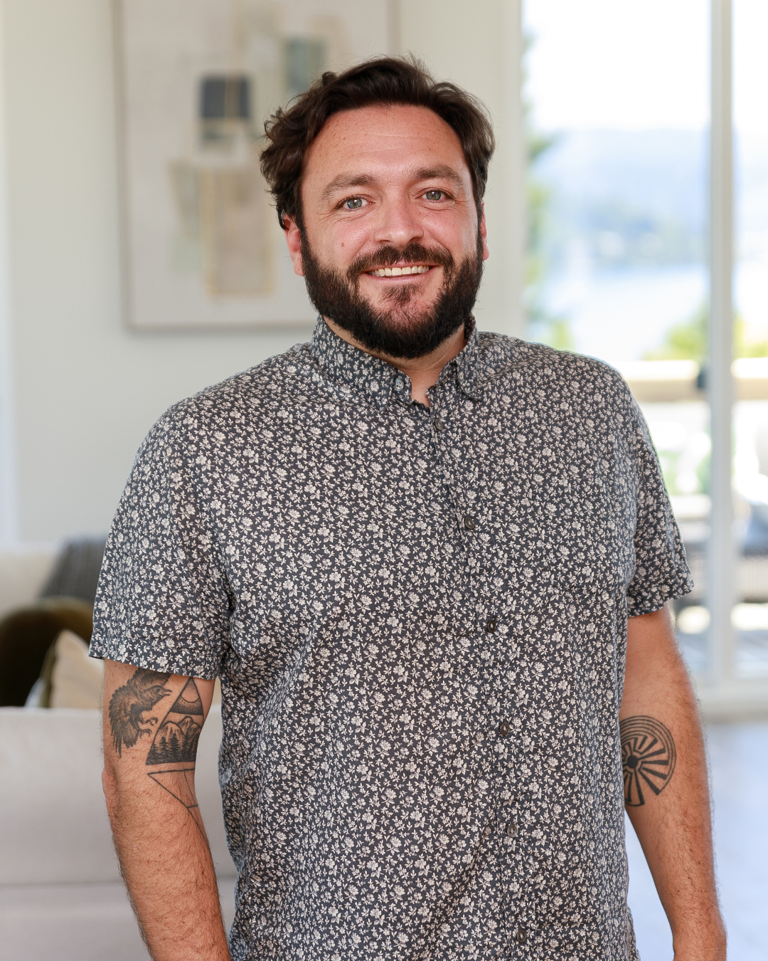 Michael Pearsall, trusted West Seattle realtor, standing confidently with a friendly smile—experienced, professional, and dedicated to guiding clients through every step of the real estate journey.”