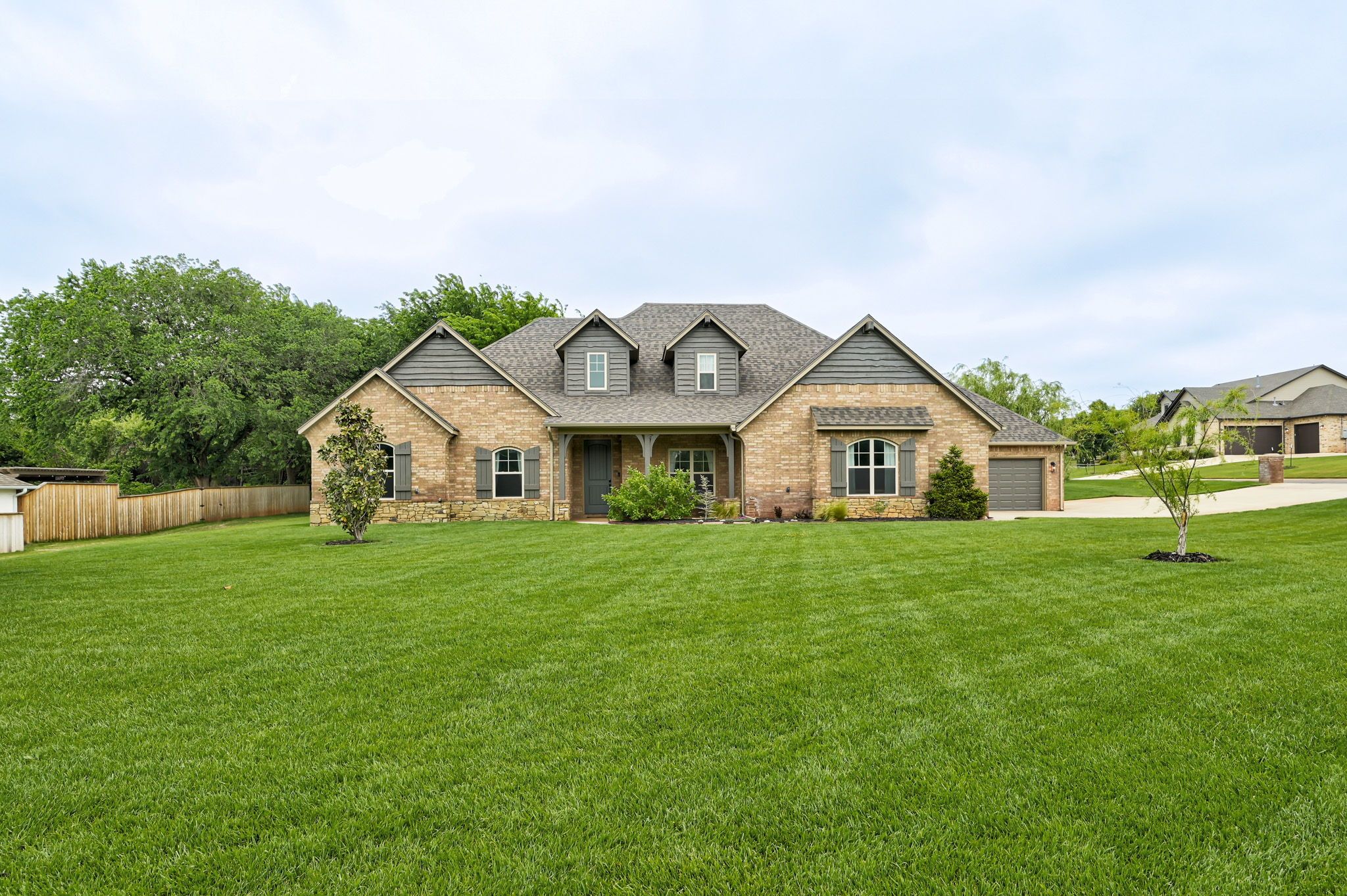 Front exterior of 10430 Pine Ridge Road in The Ridge, Edmond Oklahoma