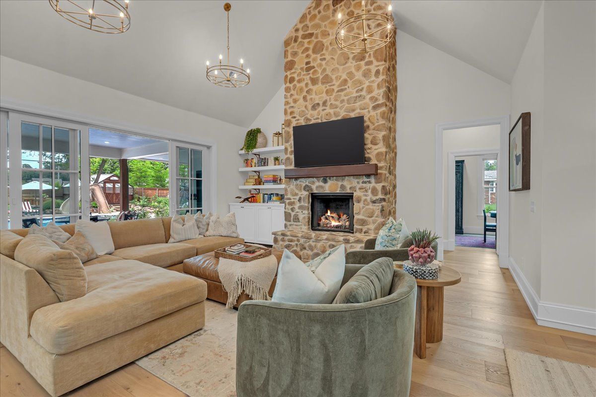 Custom stone fireplace and open great room in Bethany Oklahoma luxury home