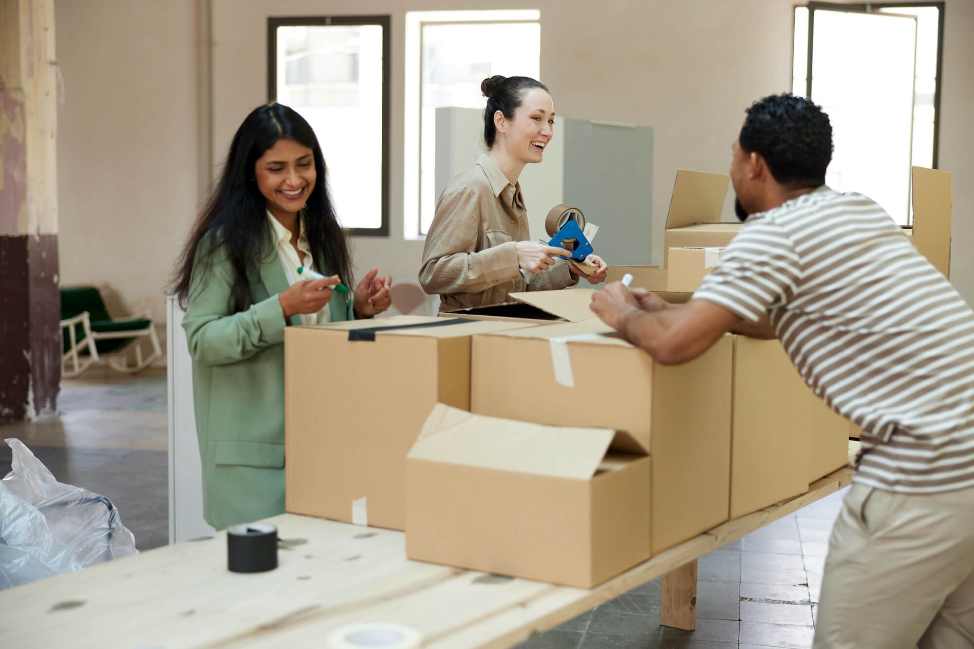 coworkers packing