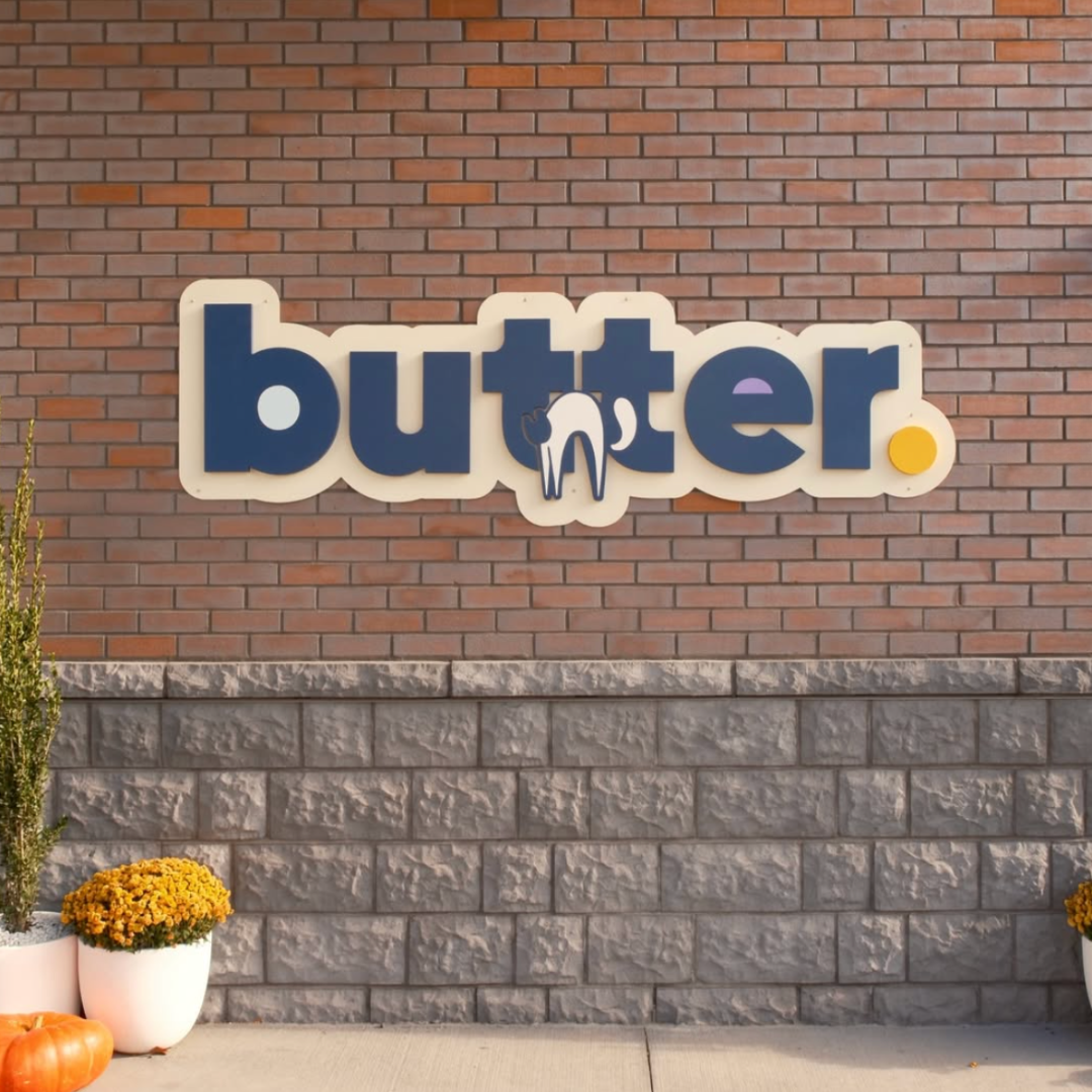 Front view of Sicilian Guy Italian Sandwiches storefront with a black 