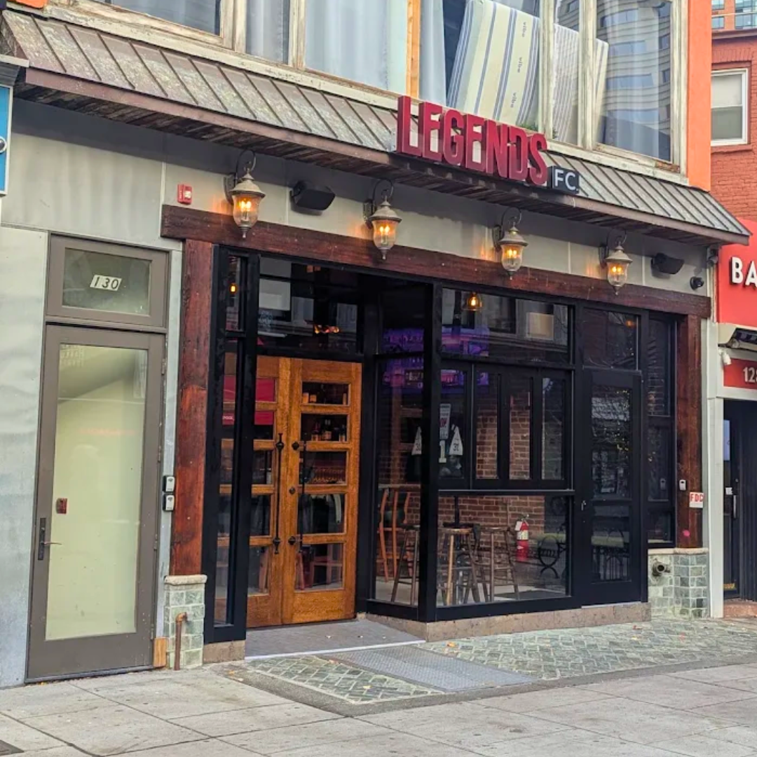 Front view of Sicilian Guy Italian Sandwiches storefront with a black 