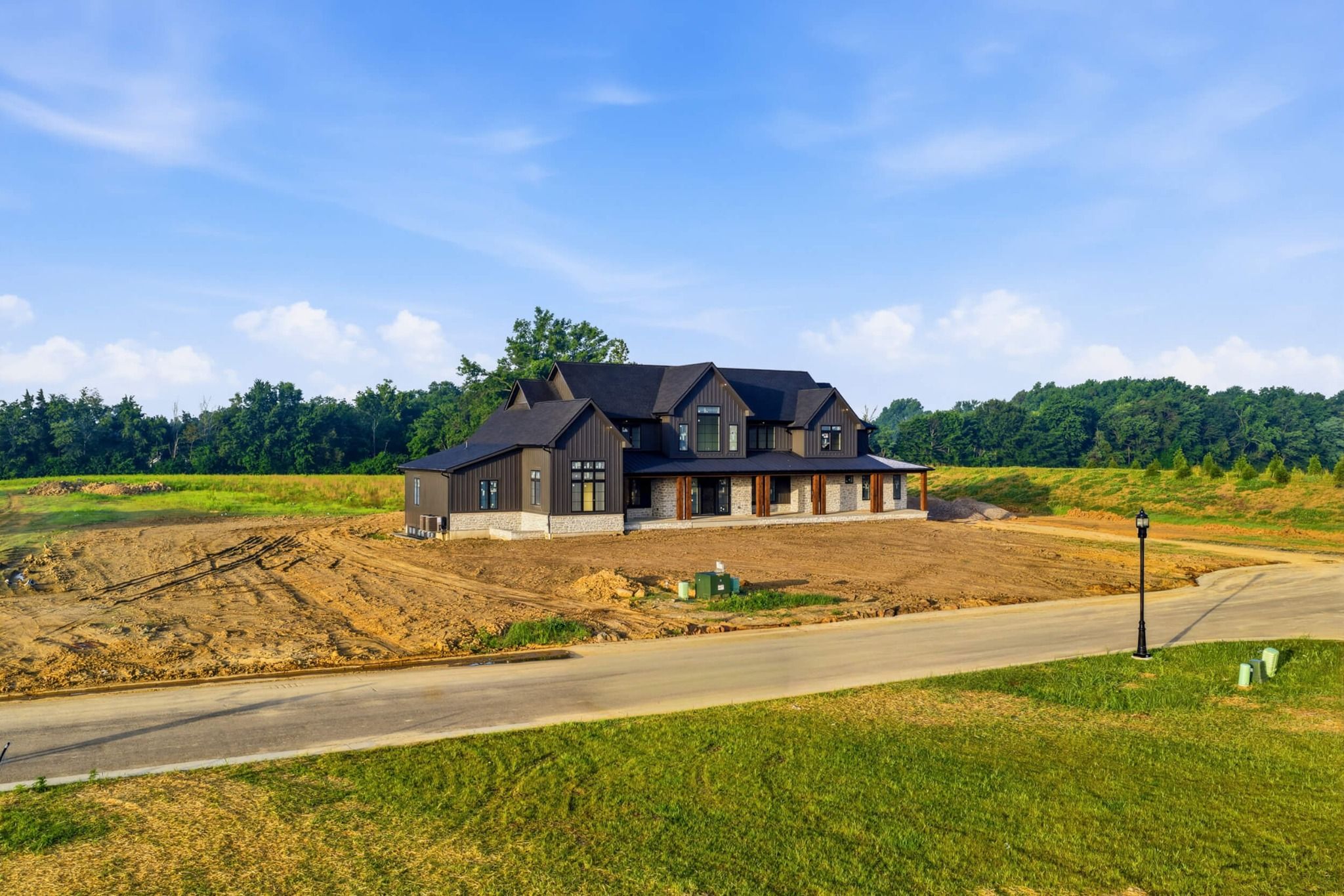 Elevated wide view of the property and surrounding land