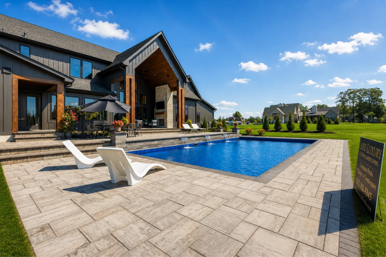 Covered veranda with stone fireplace and seating