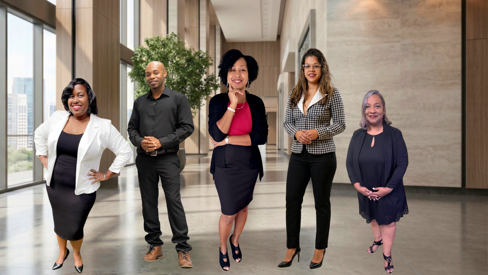 Group of diverse professionals in business attire posing in modern office lobby with plants and glass walls