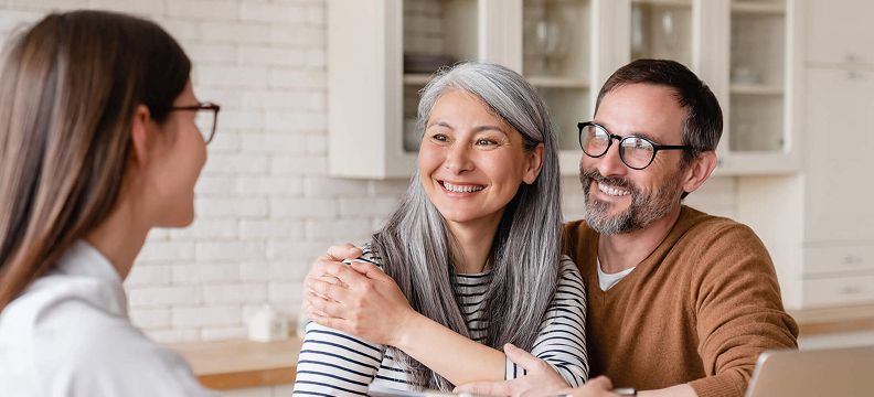 couple talking to a financial advisor