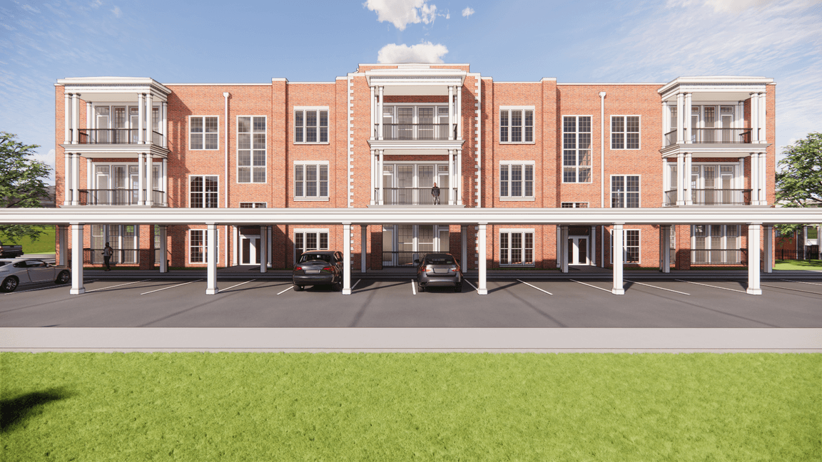 bay with boats in it and town in background