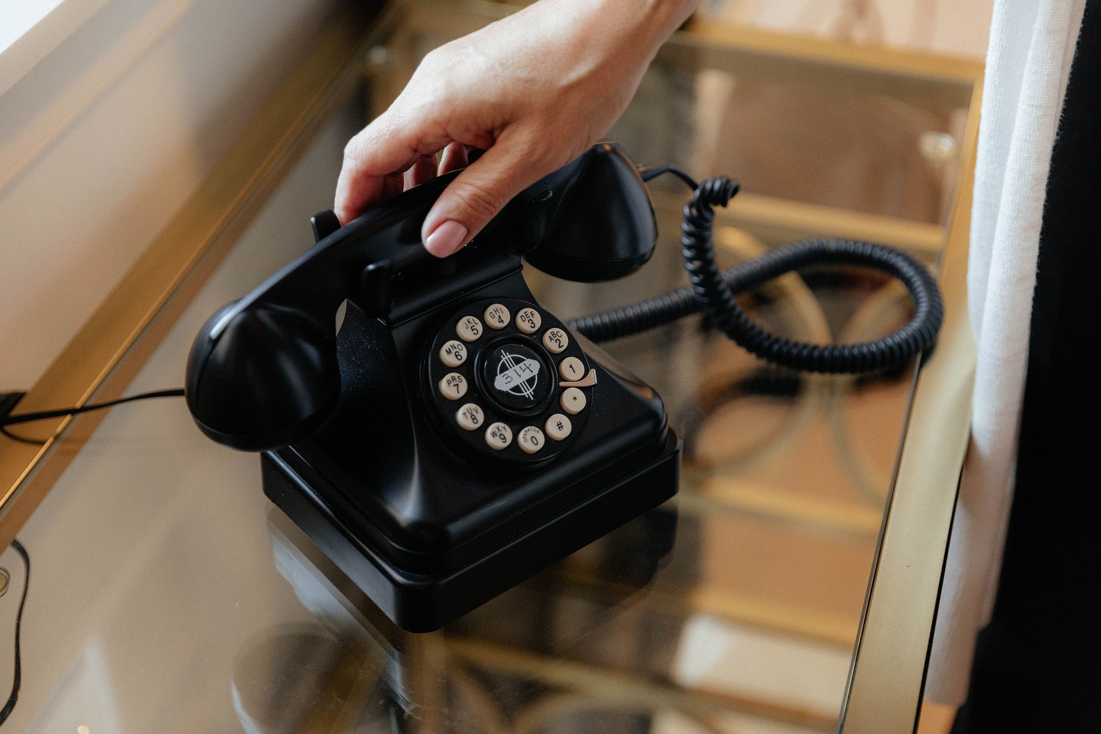 picking up old style telephone
