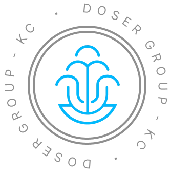 Logo of a key with dollar sign and house shape, surrounded by circular text 