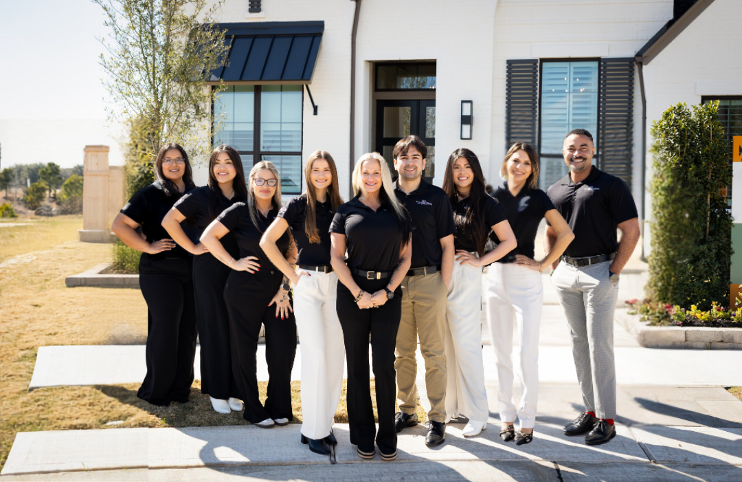 Tricia Turner Group team outside a home
