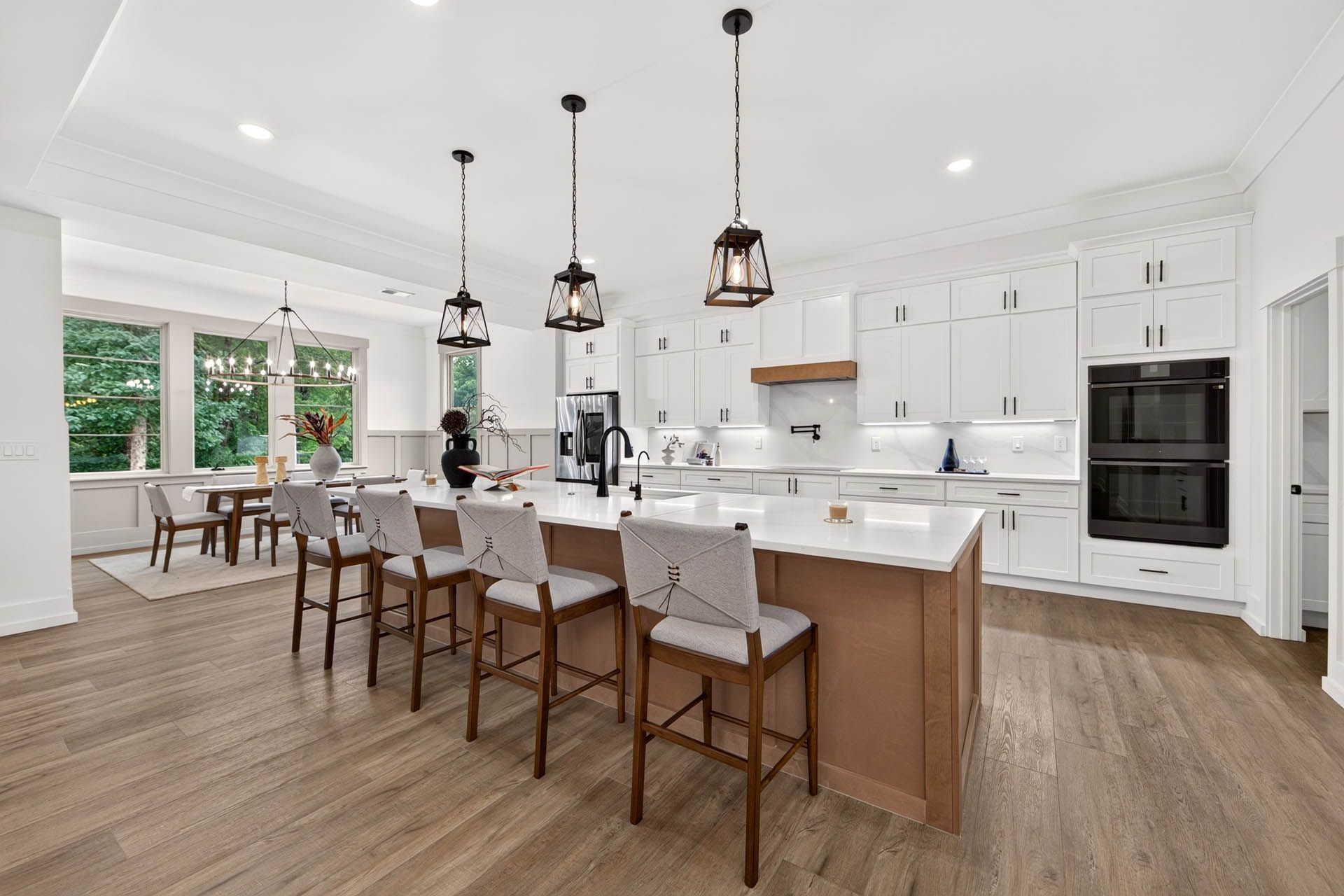 Kitchen with oversized island and custom cabinetry