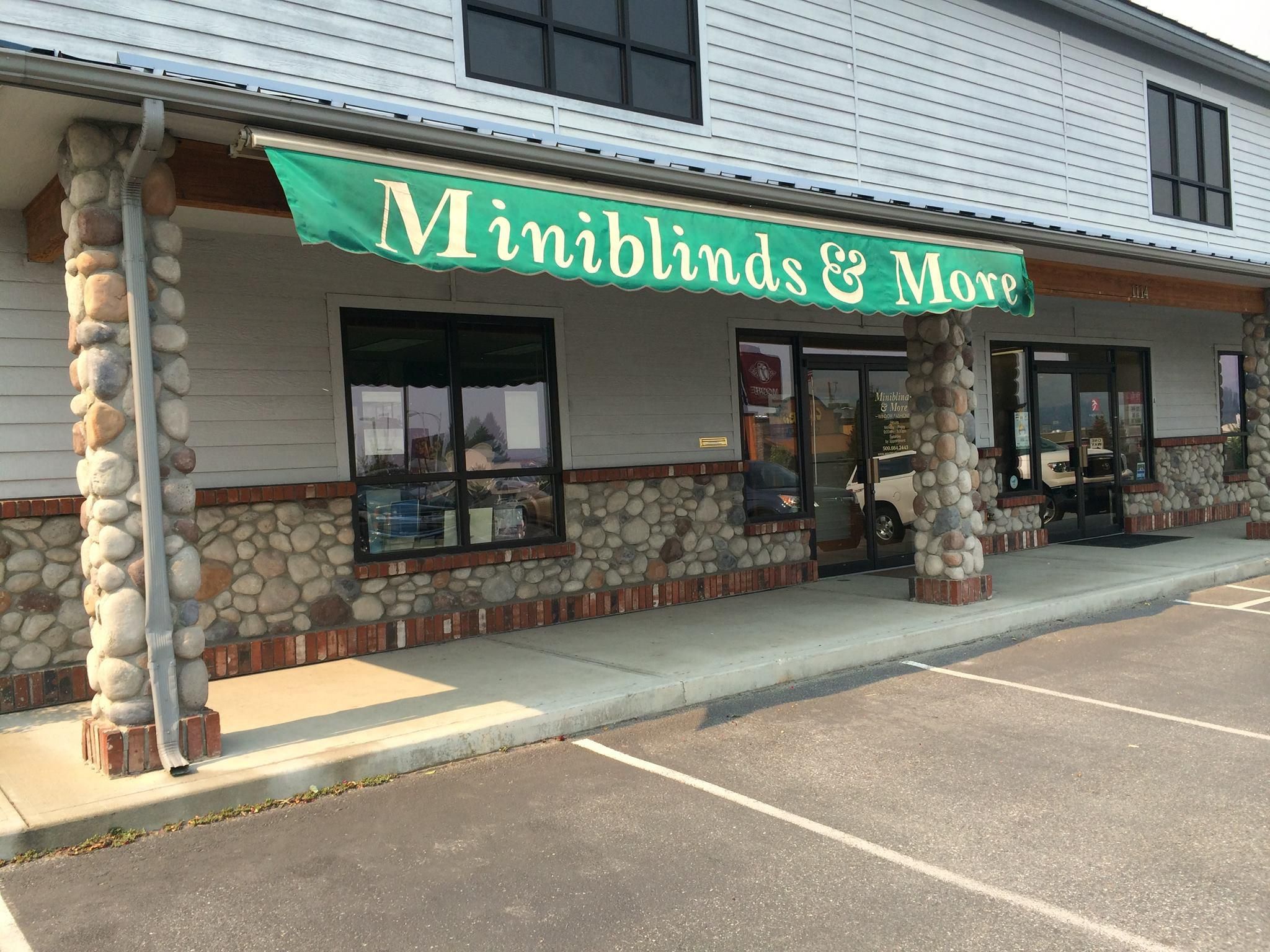 Hopewell Brewing Company coffee roasting and cafe shop in Chicago with exterior view during sunset featuring the espresso sign and clock tower.