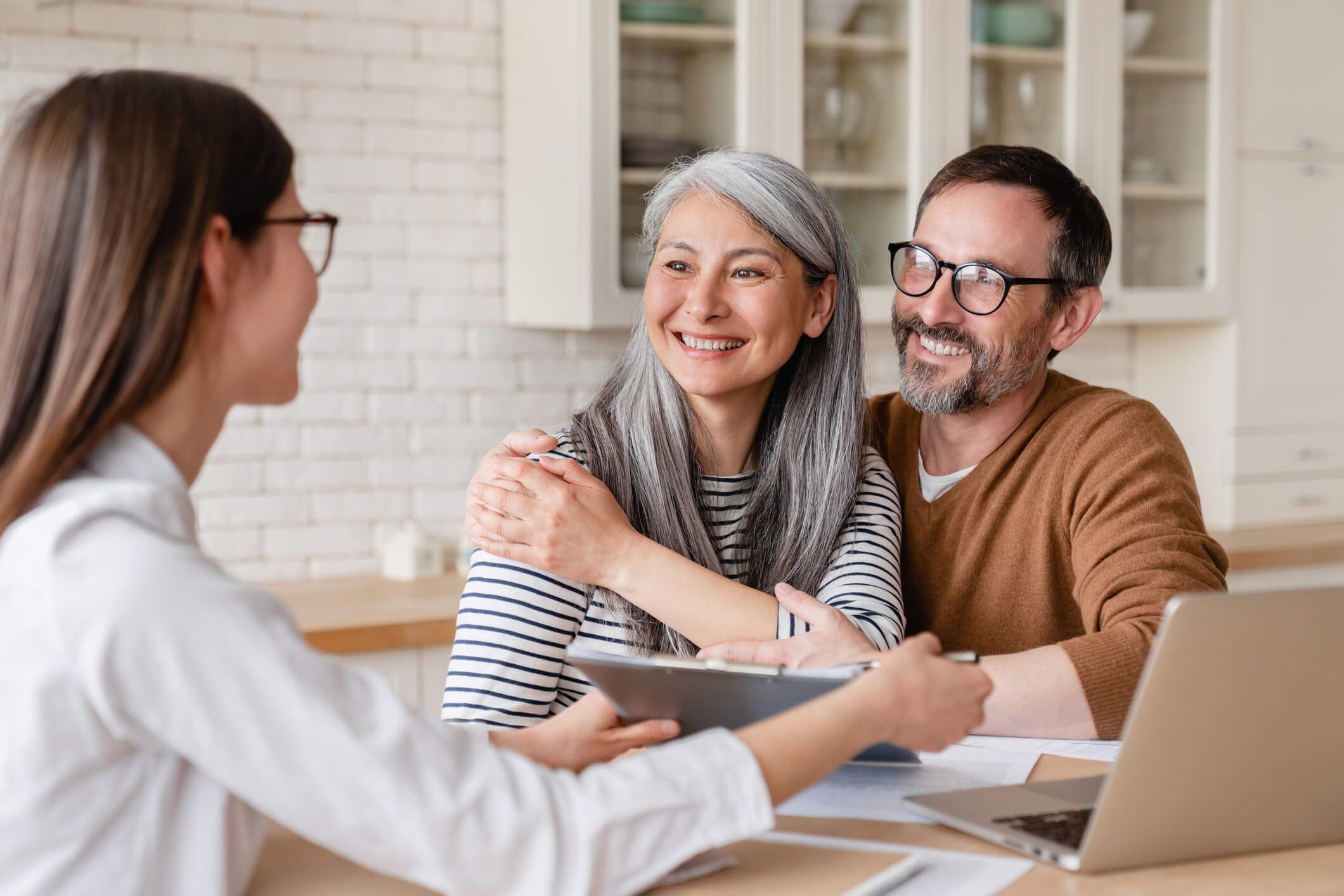 Agent helps couple with paperwork