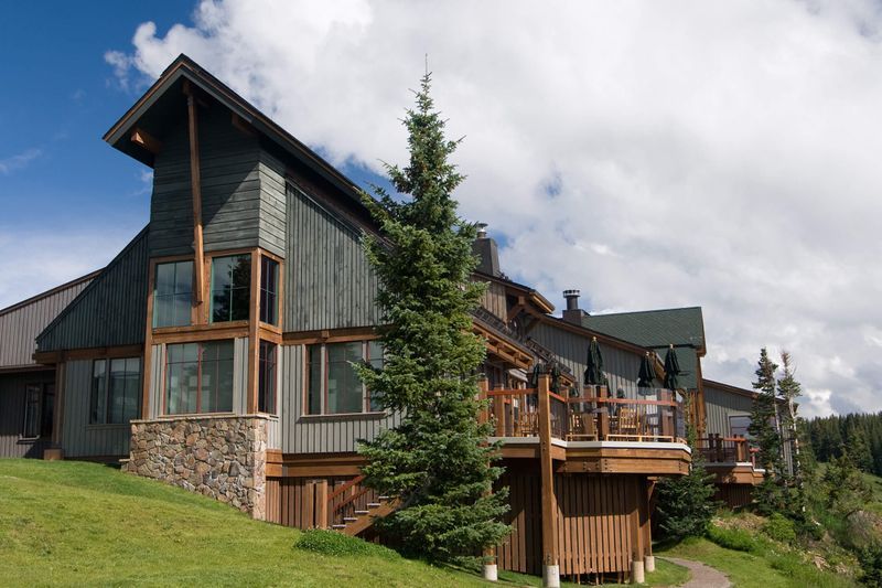 modern home sunset in background