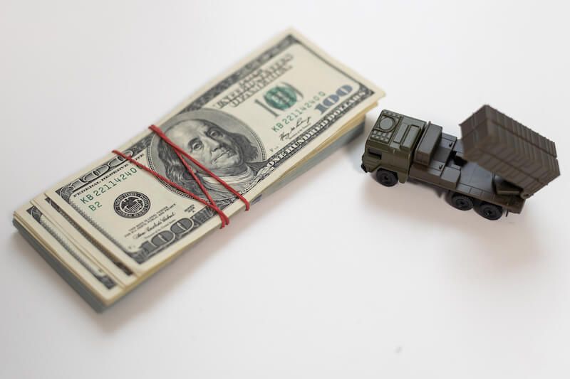 money and toy tank