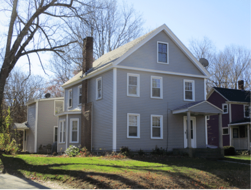 Two-family investment property on Main Street in Holden, MA with blue siding