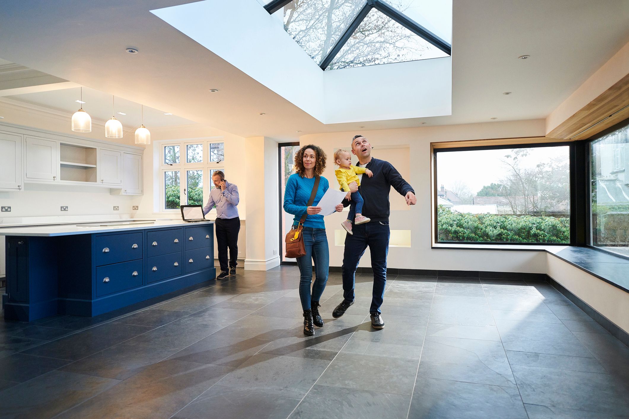 Couple cuddles on couch