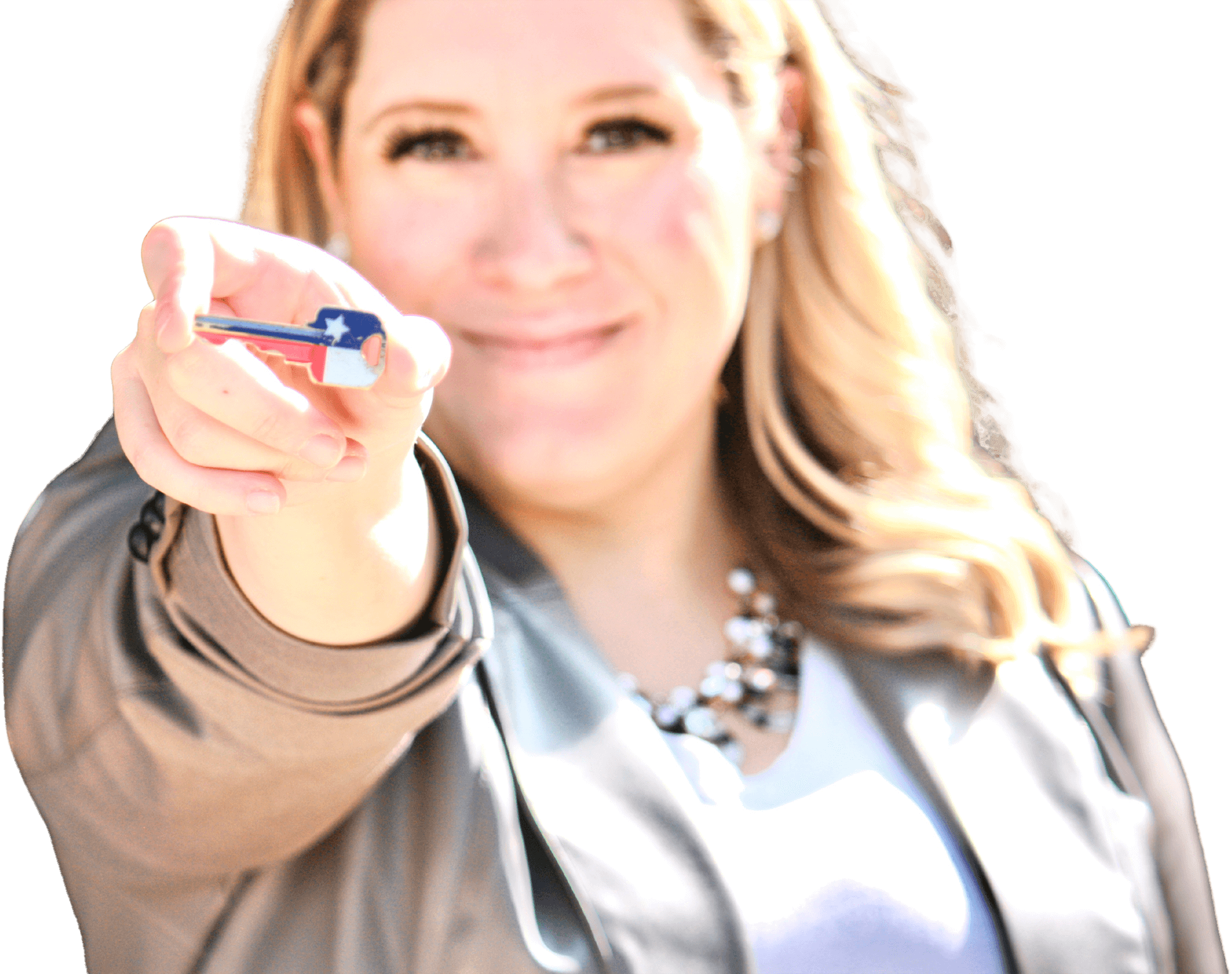 Woman holding a key with an American flag design, symbolizing patriotism or homeownership.