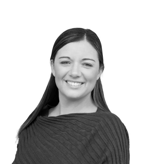 Smiling woman with long dark hair wearing a textured sweater, isolated on a transparent background