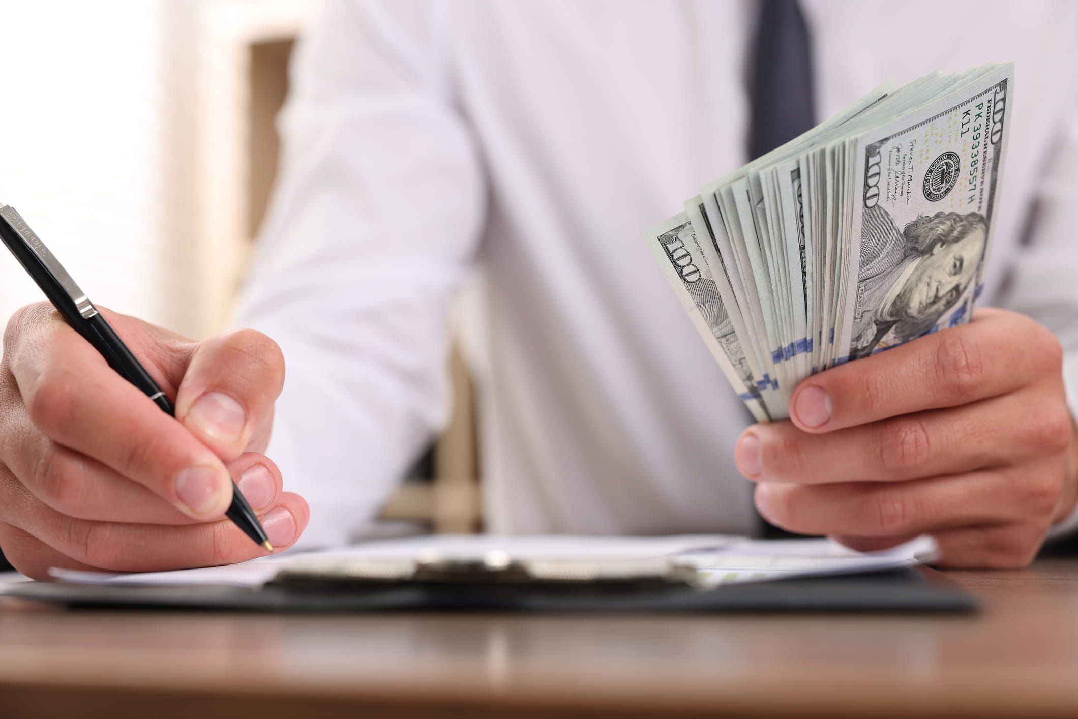 banker counting money