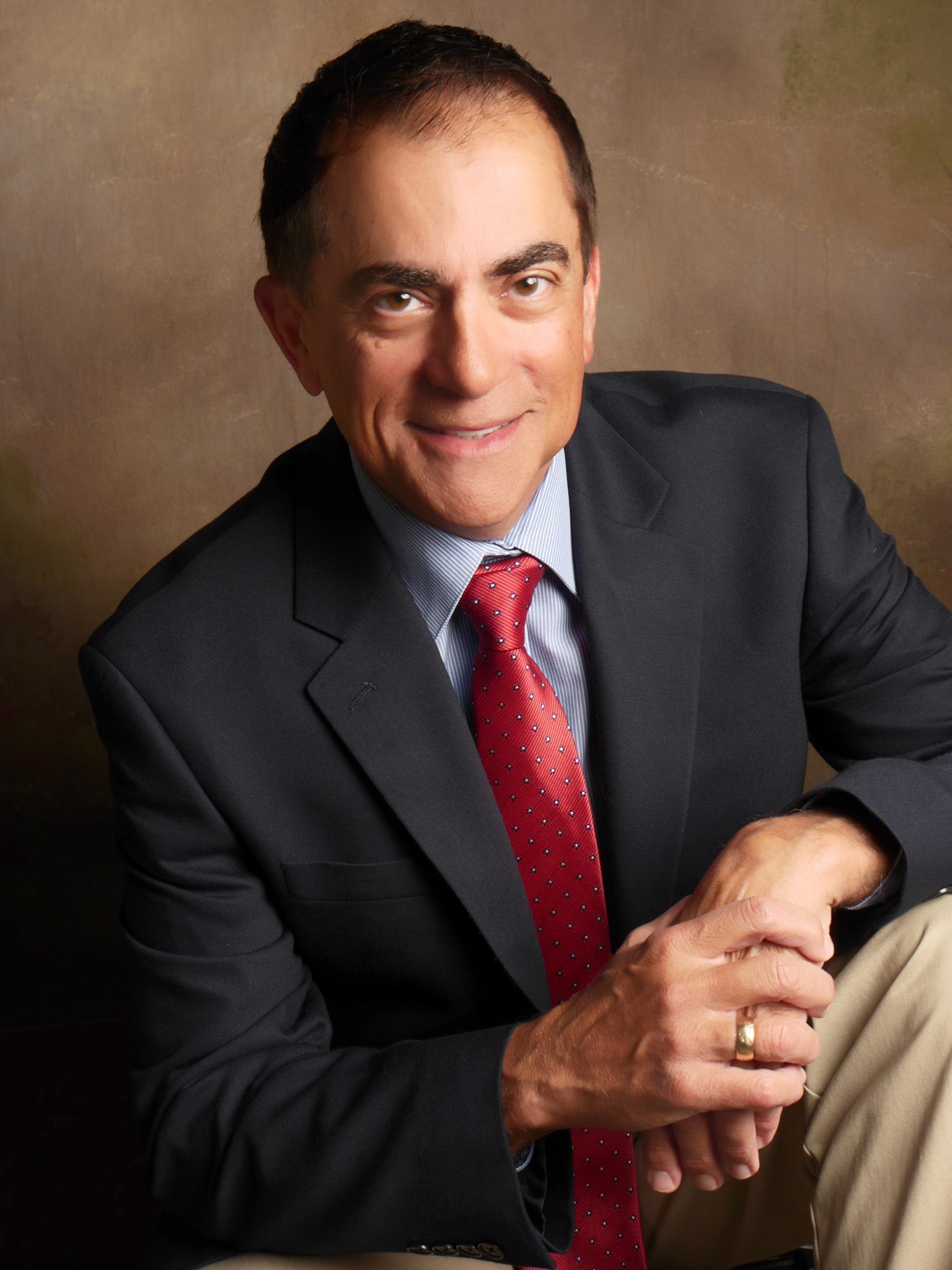 Elegant monogram logo featuring intertwined black letter D and stylized letter J