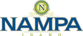 Nampa logo featuring a blue and gold emblem with the letter N and the word Nampa in bold blue font
