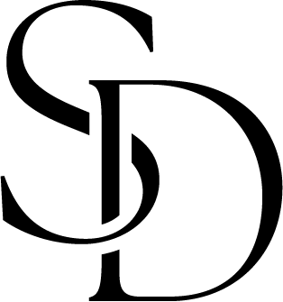 Burnett Real Estate Co logo with an anchor symbol inside a black circle and the company name encircling it