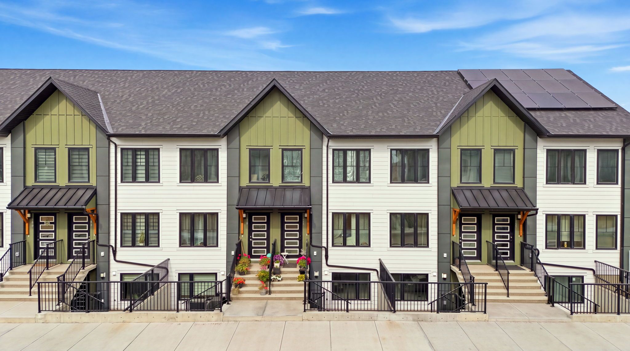Front exterior of the ZEN Livingston townhomes on Livingston Parade NE, Calgary