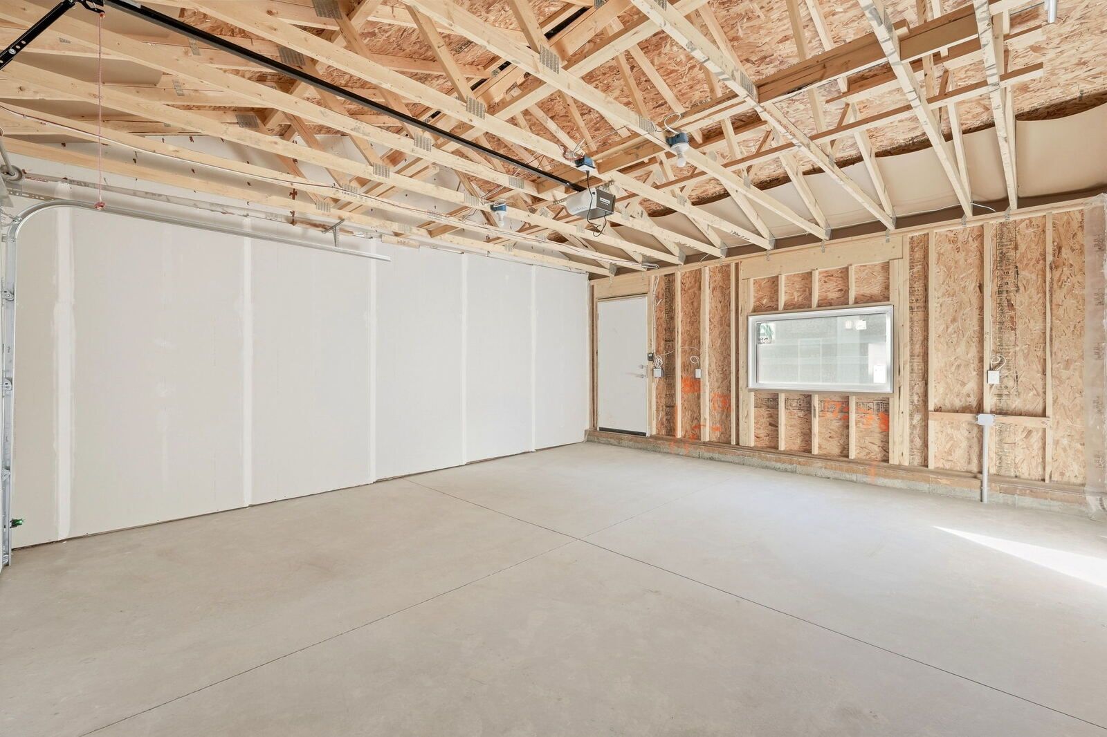 Double detached garage interior, unstaged