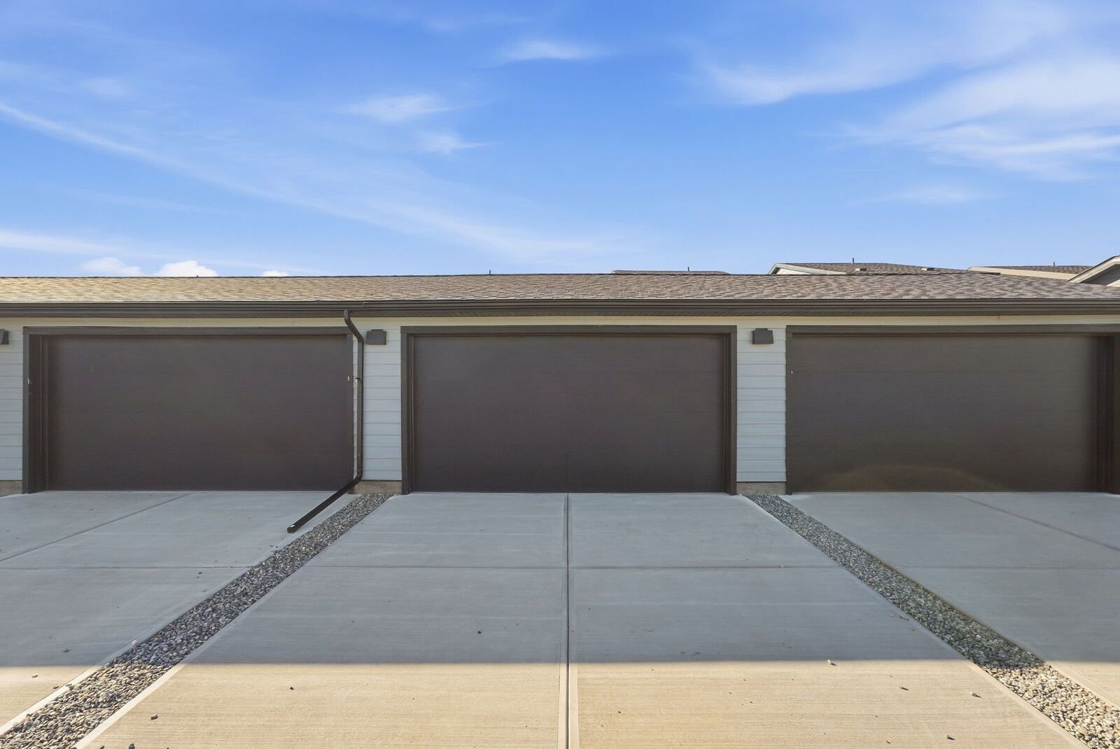Rear double garage and driveway at 225 Vantage Drive