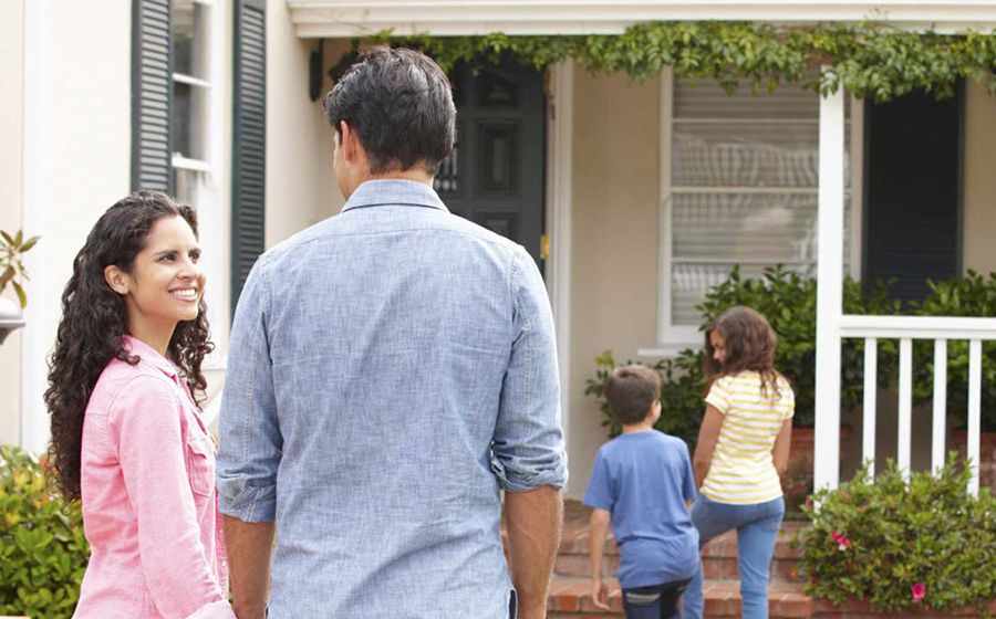 Young Couple Moving into New Home