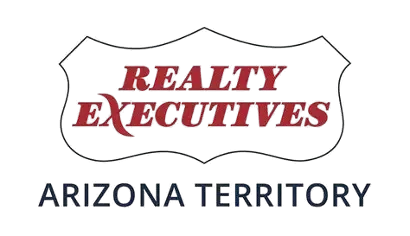 Realty Executives real estate company logo featuring bold red and white text on a navy blue background