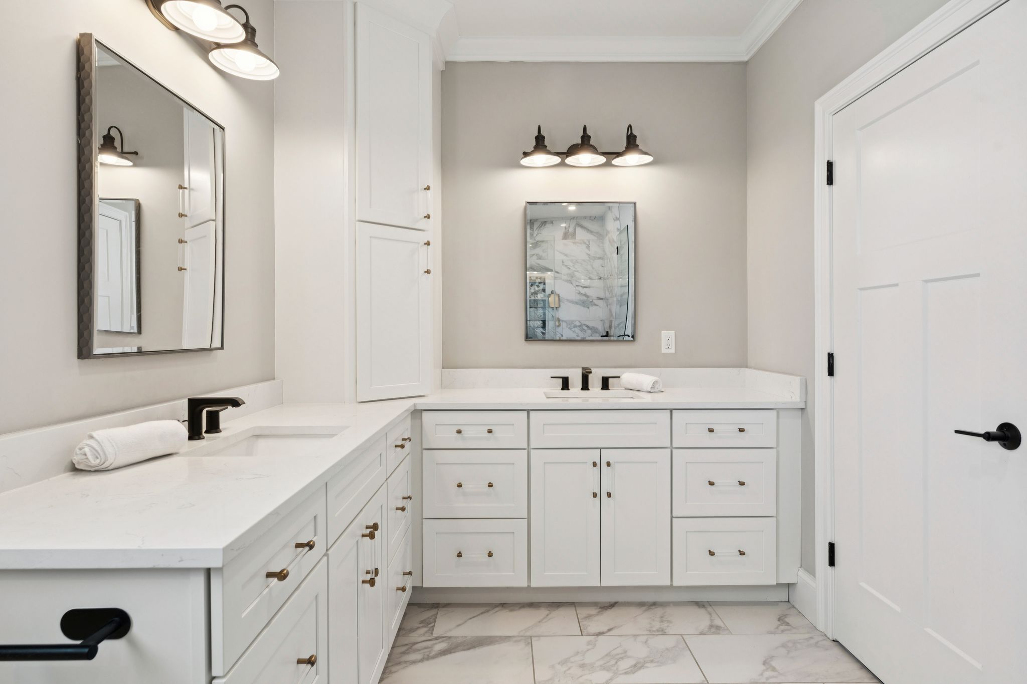 Snow-covered backyard with leafless trees and a clear blue sky during winter day