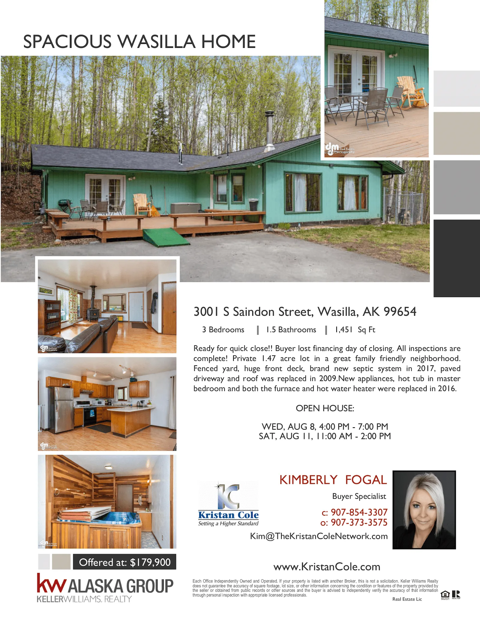 Spacious Wasilla home featuring a front porch, green exterior, large windows, and surrounding forest in Wasilla, Alaska.