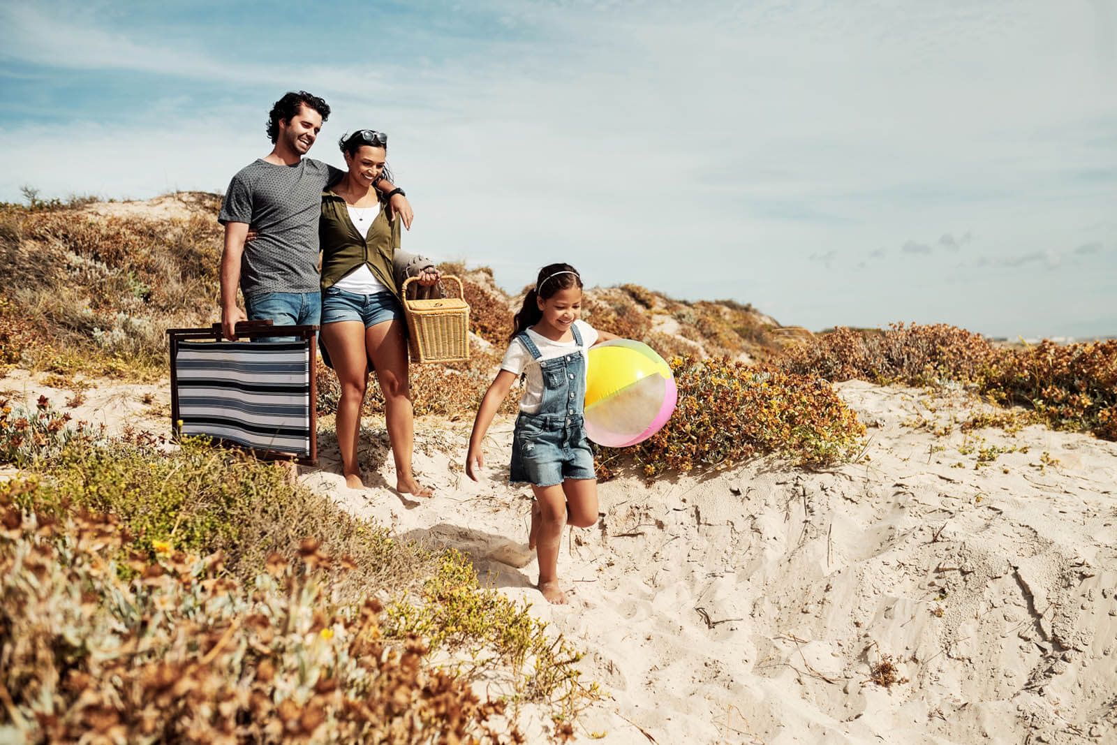 Family walking at the beach