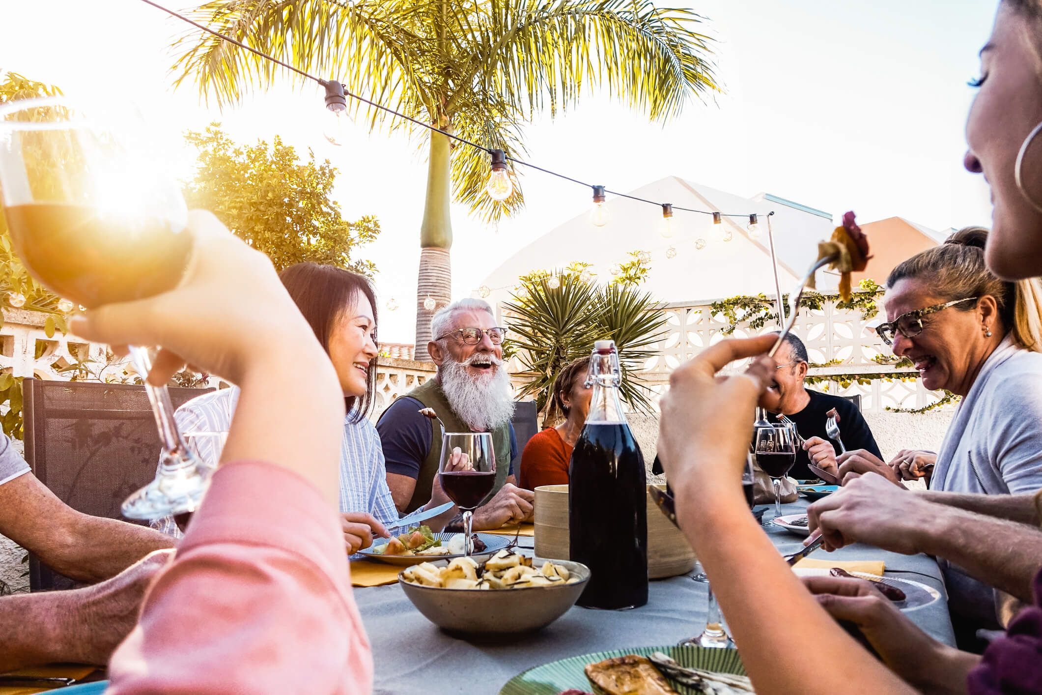 Friends eating at restaurant outside