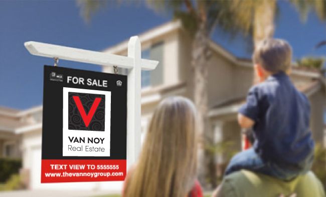 people looking at a house with a For Sale advertisement by The Van Noy Real Estate