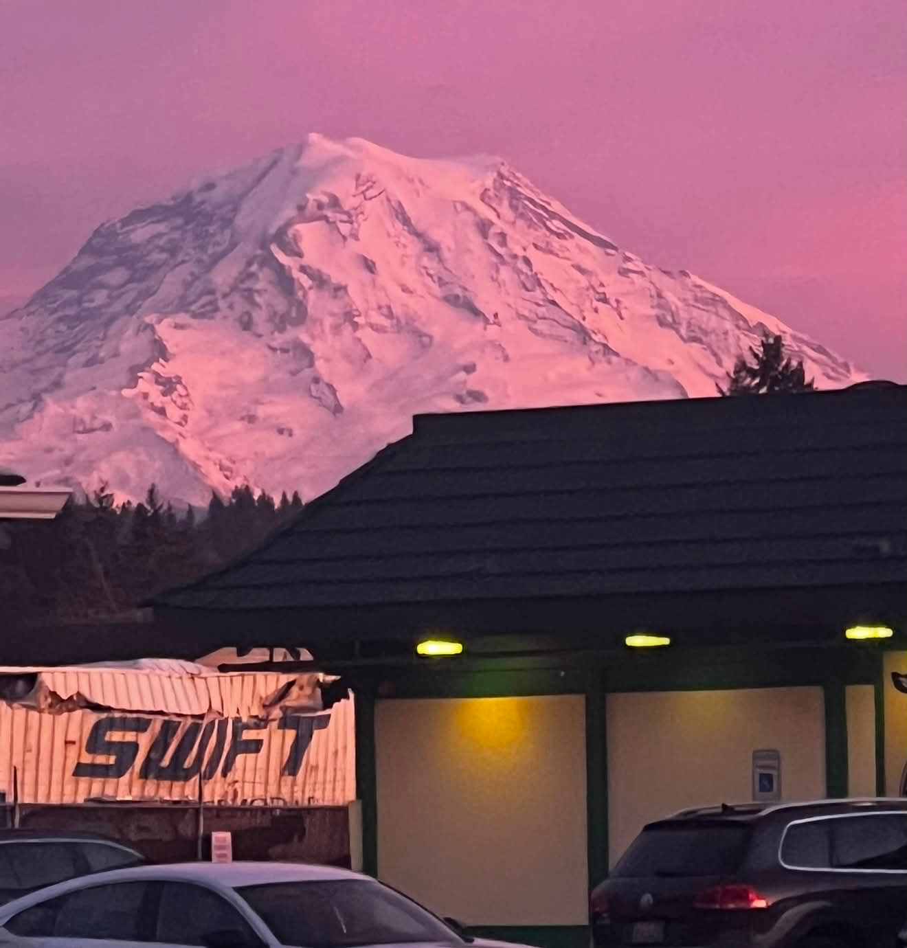 Mount Rainier towering over historic downtown Puyallup, Washington, seen from Main Street