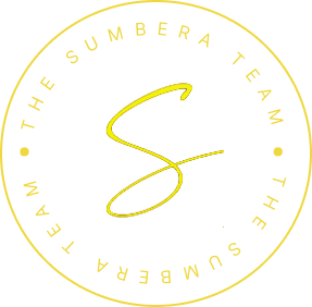 Logo of a key with dollar sign and house shape, surrounded by circular text 
